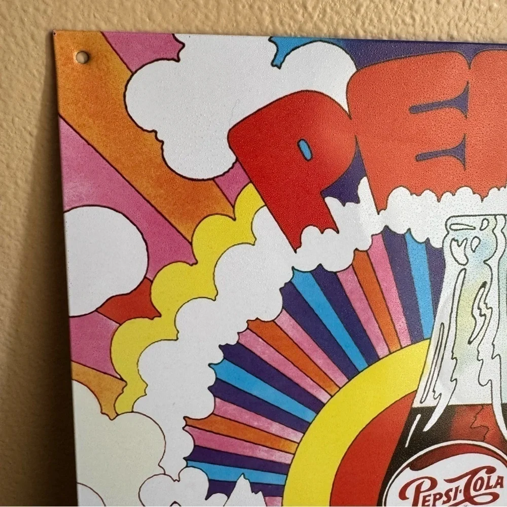 Metal colorful sunburst Pepsi cola sign